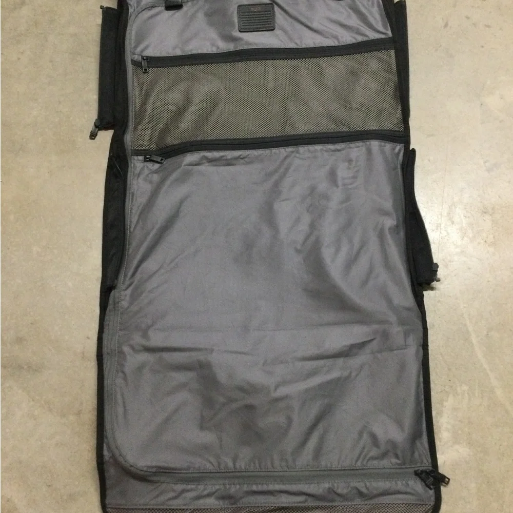 Tumi Black Men's Travel Duffel with Front Zip Pocket and Carry Handles